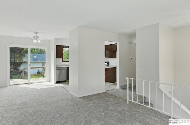 13304 S 21st St, Bellevue, NE 68123 - empty room featuring light carpet and a ceiling fan