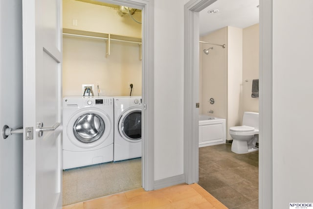 3200 Farnam Ct Unit 3604, Omaha, NE 68131 - washroom featuring washer and dryer and tile patterned flooring