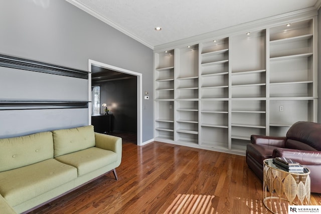 716 N 148th St, Omaha, NE 68154 - living area featuring crown molding, built in shelves, wood finished floors, baseboards, and recessed lighting