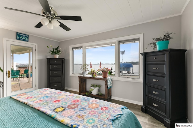 112 W Lakeshore Dr, Lincoln, NE 68528 - bedroom with light wood-type flooring, ornamental molding, access to exterior, baseboards, and a ceiling fan
