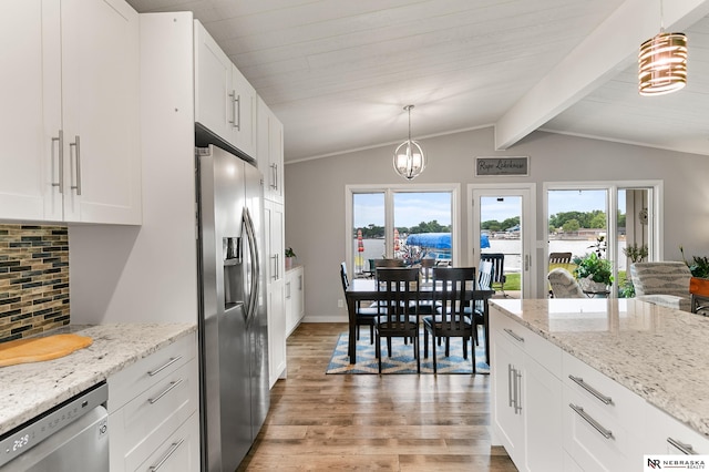 112 W Lakeshore Dr, Lincoln, NE 68528 - kitchen featuring stainless steel appliances, light wood-style floors, backsplash, white cabinets, and plenty of natural light