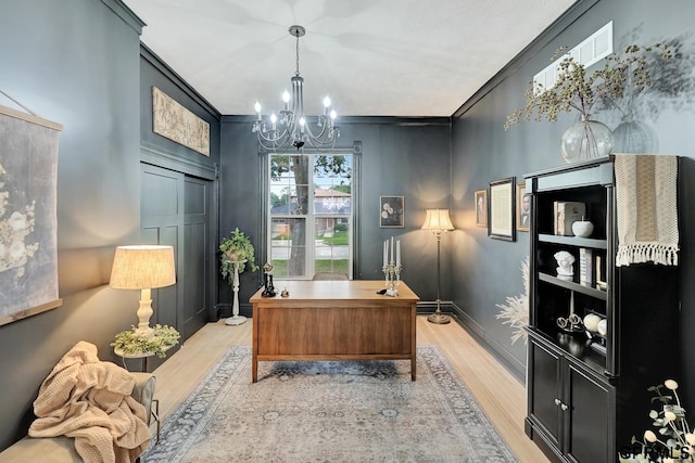 149 N 1st St, Seward, NE 68434 - office area featuring light wood-style floors, a chandelier, and ornamental molding