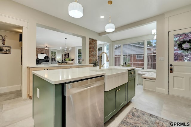 149 N 1st St, Seward, NE 68434 - kitchen with green cabinetry, stainless steel dishwasher, a sink, open floor plan, and recessed lighting