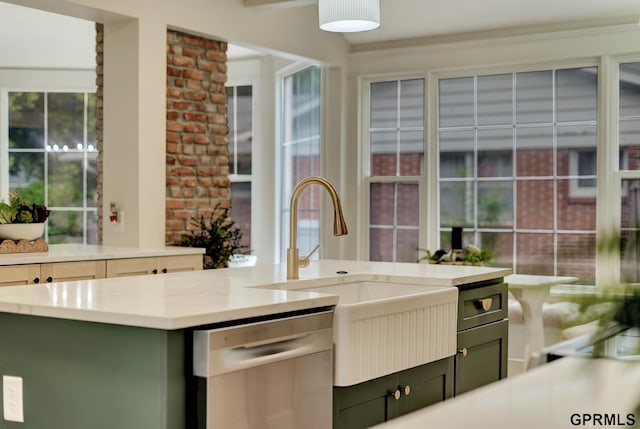 149 N 1st St, Seward, NE 68434 - kitchen with green cabinets, dishwasher, a sink, and light stone counters