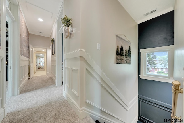 149 N 1st St, Seward, NE 68434 - corridor featuring a decorative wall, carpet flooring, a wainscoted wall, and ornamental molding