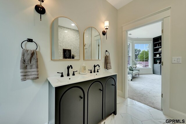 149 N 1st St, Seward, NE 68434 - full bathroom featuring double vanity and baseboards