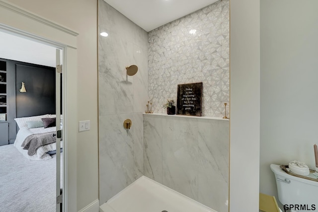 149 N 1st St, Seward, NE 68434 - full bathroom featuring a marble finish shower, toilet, and connected bathroom