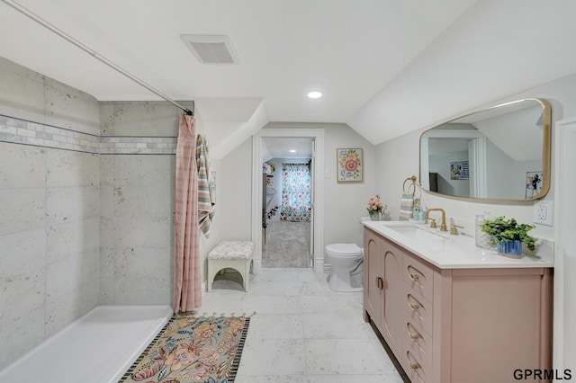 149 N 1st St, Seward, NE 68434 - full bath featuring toilet, vanity, tiled shower, and lofted ceiling