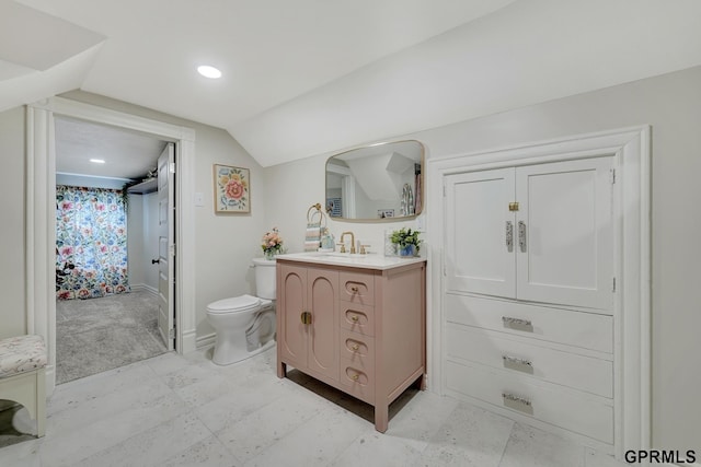 149 N 1st St, Seward, NE 68434 - bathroom featuring vanity, toilet, vaulted ceiling, a shower with curtain, and recessed lighting