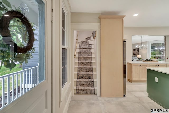 149 N 1st St, Seward, NE 68434 - corridor with stairs, a chandelier, and recessed lighting