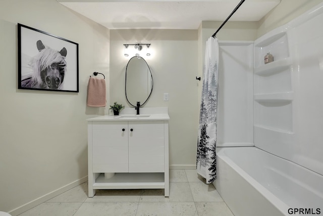 149 N 1st St, Seward, NE 68434 - bathroom featuring vanity, baseboards, shower / bath combo with shower curtain, and tile patterned floors