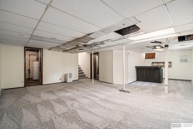 4427 Pine St, Omaha, NE 68105 - finished basement with water heater, a drop ceiling, stairs, carpet floors, and bar