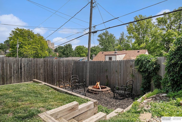 4427 Pine St, Omaha, NE 68105 - view of yard featuring an outdoor fire pit