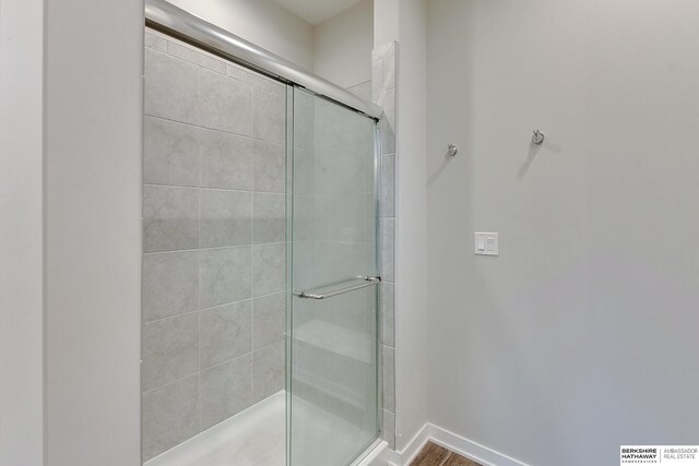 8622 N 177th St, Bennington, NE 68007 - bathroom featuring a shower stall and baseboards