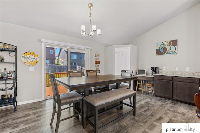 7784 N 88th Ave, Omaha, NE 68122 - dining space with a chandelier and dark wood finished floors