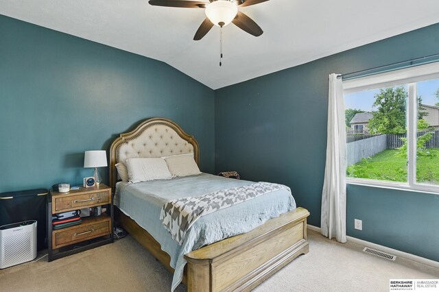 7628 Bondesson St, Omaha, NE 68122 - carpeted bedroom with baseboards, ceiling fan, and lofted ceiling