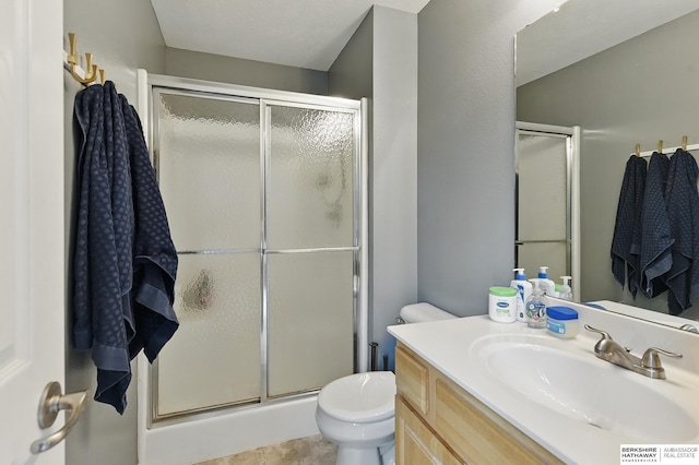 7628 Bondesson St, Omaha, NE 68122 - bathroom with a shower stall, toilet, and vanity