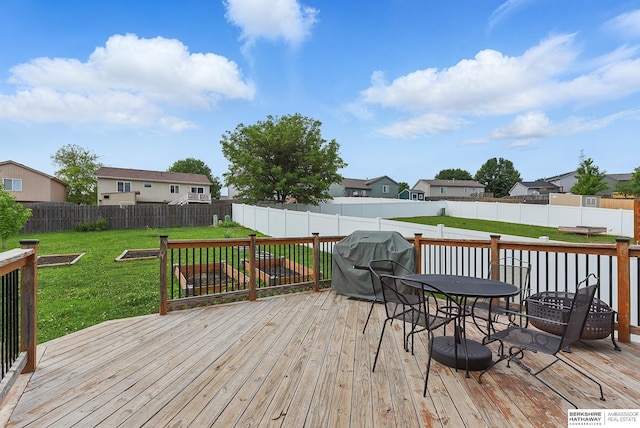 7628 Bondesson St, Omaha, NE 68122 - deck with a grill, outdoor dining area, and a residential view
