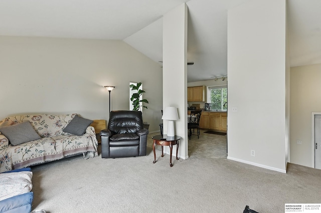 7628 Bondesson St, Omaha, NE 68122 - living area with light colored carpet and vaulted ceiling