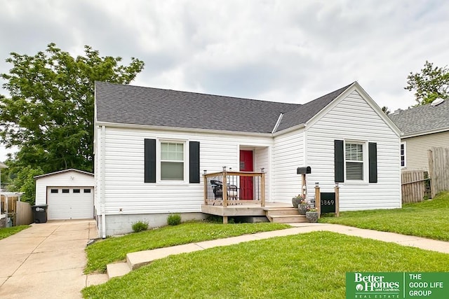 3869 Arbor St, Omaha, NE 68105 - view of front of home featuring an outdoor structure, concrete driveway, a detached garage, and a shingled roof