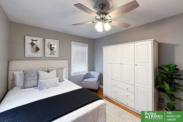 3869 Arbor St, Omaha, NE 68105 - bedroom with wood finished floors, ceiling fan, baseboards, and a closet