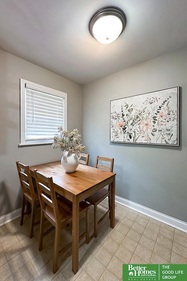 3869 Arbor St, Omaha, NE 68105 - dining area featuring baseboards