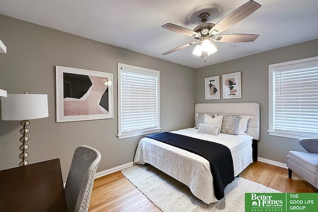 3869 Arbor St, Omaha, NE 68105 - bedroom featuring baseboards, wood finished floors, and ceiling fan