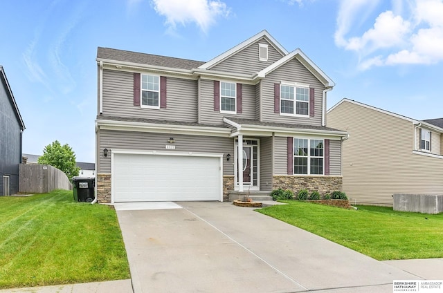 8925 N 159th Ave, Bennington, NE 68007 - view of front of property with stone siding, an attached garage, and driveway