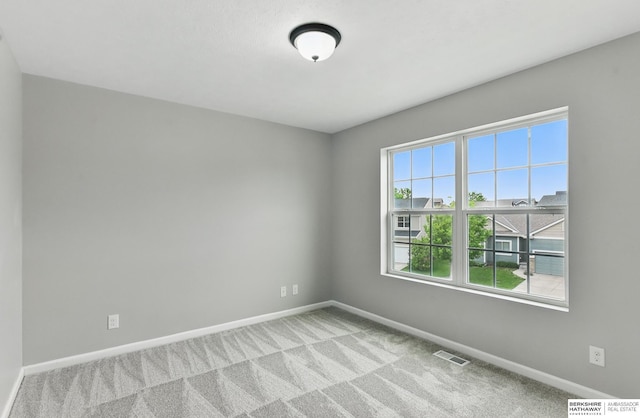 8925 N 159th Ave, Bennington, NE 68007 - carpeted empty room featuring baseboards