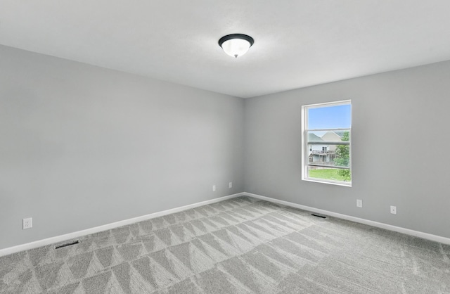 8925 N 159th Ave, Bennington, NE 68007 - carpeted spare room featuring baseboards