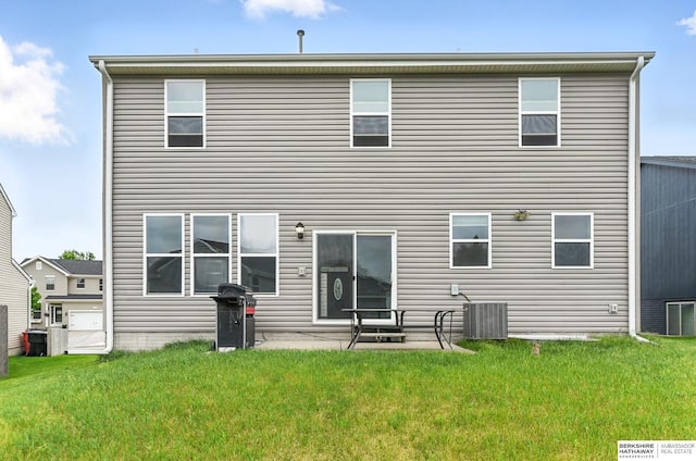 8925 N 159th Ave, Bennington, NE 68007 - back of property with a yard, a patio, and cooling unit