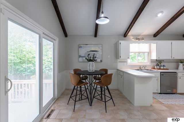 15461 Harney St, Omaha, NE 68154 - kitchen with dishwasher, beam ceiling, a sink, white cabinetry, and light countertops
