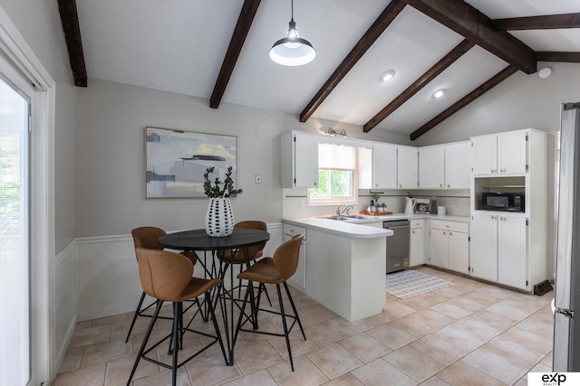 15461 Harney St, Omaha, NE 68154 - kitchen with appliances with stainless steel finishes, a peninsula, light countertops, white cabinetry, and a sink