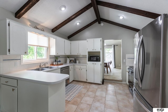 15461 Harney St, Omaha, NE 68154 - kitchen featuring black appliances, a sink, a peninsula, healthy amount of natural light, and recessed lighting