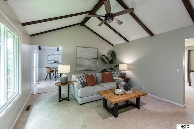 15461 Harney St, Omaha, NE 68154 - living room featuring a ceiling fan, light colored carpet, and baseboards