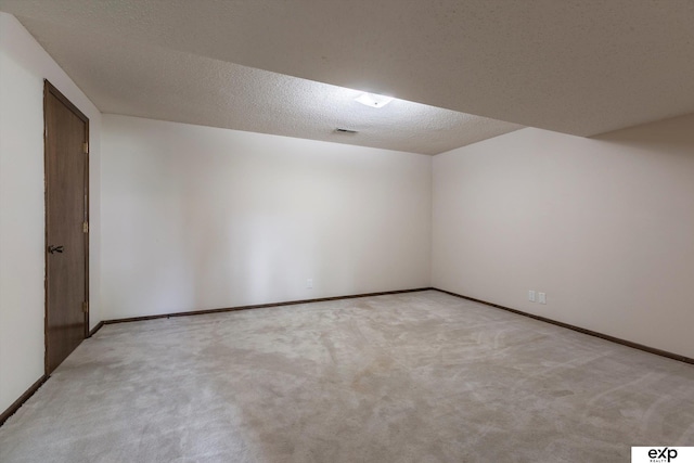 15461 Harney St, Omaha, NE 68154 - bonus room featuring light colored carpet, a textured ceiling, and baseboards