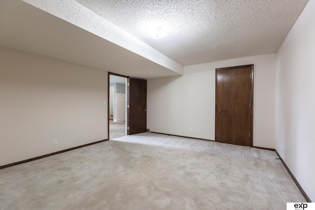 15461 Harney St, Omaha, NE 68154 - unfurnished room featuring light colored carpet, baseboards, and a textured ceiling
