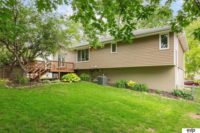 15461 Harney St, Omaha, NE 68154 - back of property featuring a deck, central AC unit, and stairs