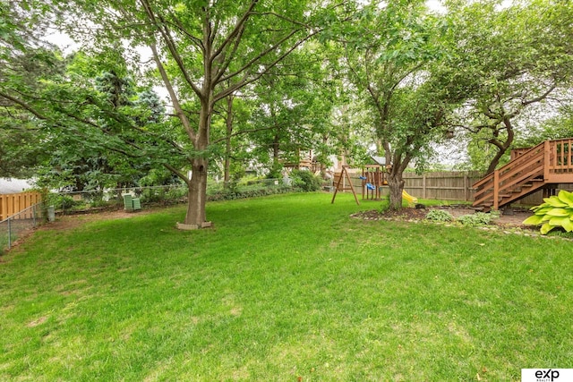 15461 Harney St, Omaha, NE 68154 - view of yard featuring a playground and stairway