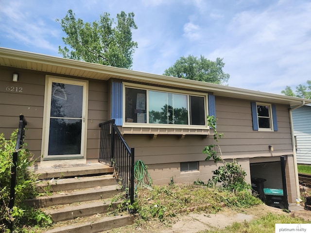 6212 Fort St, Omaha, NE 68104 - view of front of property with an attached garage