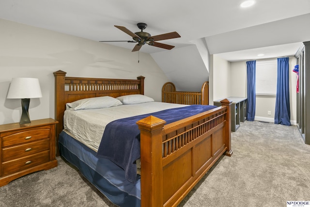 S-1020 Platte Shore Dr, Fremont, NE 68025 - bedroom with light carpet, a ceiling fan, vaulted ceiling, recessed lighting, and baseboards