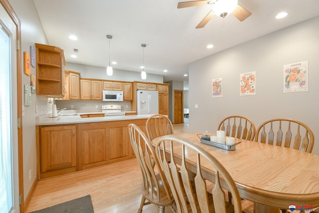 3934 Ballard Ct, Lincoln, NE 68504 - dining area featuring light wood-type flooring, recessed lighting, a ceiling fan, and baseboards