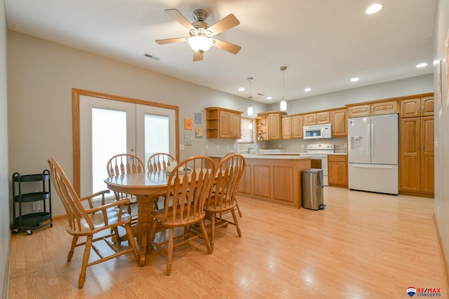3934 Ballard Ct, Lincoln, NE 68504 - dining area featuring light wood-style floors, recessed lighting, french doors, and ceiling fan