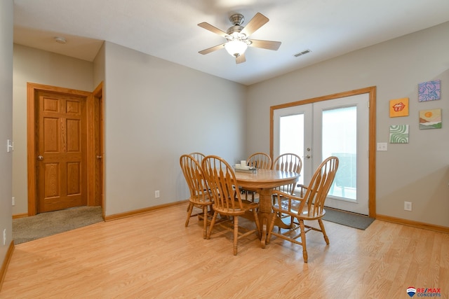 3934 Ballard Ct, Lincoln, NE 68504 - dining space with light wood-style floors, french doors, baseboards, and ceiling fan