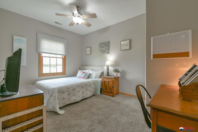 3934 Ballard Ct, Lincoln, NE 68504 - carpeted bedroom with baseboards and a ceiling fan