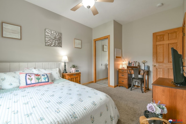 3934 Ballard Ct, Lincoln, NE 68504 - bedroom with light colored carpet, baseboards, and ceiling fan