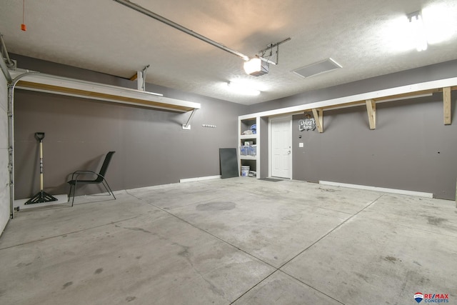 3934 Ballard Ct, Lincoln, NE 68504 - garage featuring a garage door opener