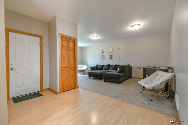 3934 Ballard Ct, Lincoln, NE 68504 - living room with light wood-style floors and baseboards
