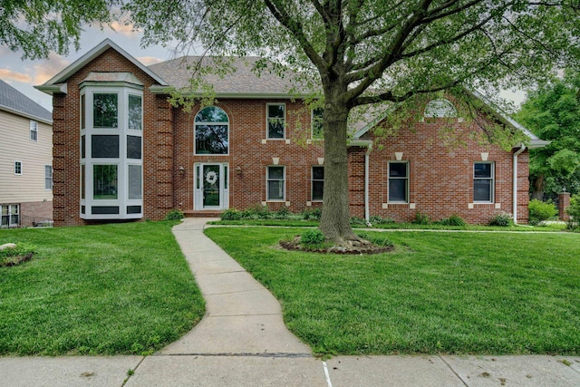 8240 Dorset Dr, Lincoln, NE 68510 - view of front of home featuring a front lawn and brick siding