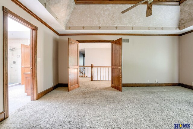 8240 Dorset Dr, Lincoln, NE 68510 - spare room with light carpet, ceiling fan, crown molding, and baseboards